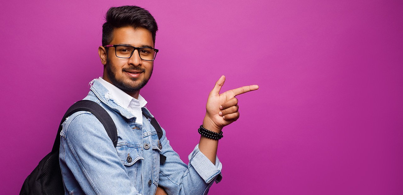 Student pointing to CET Studies